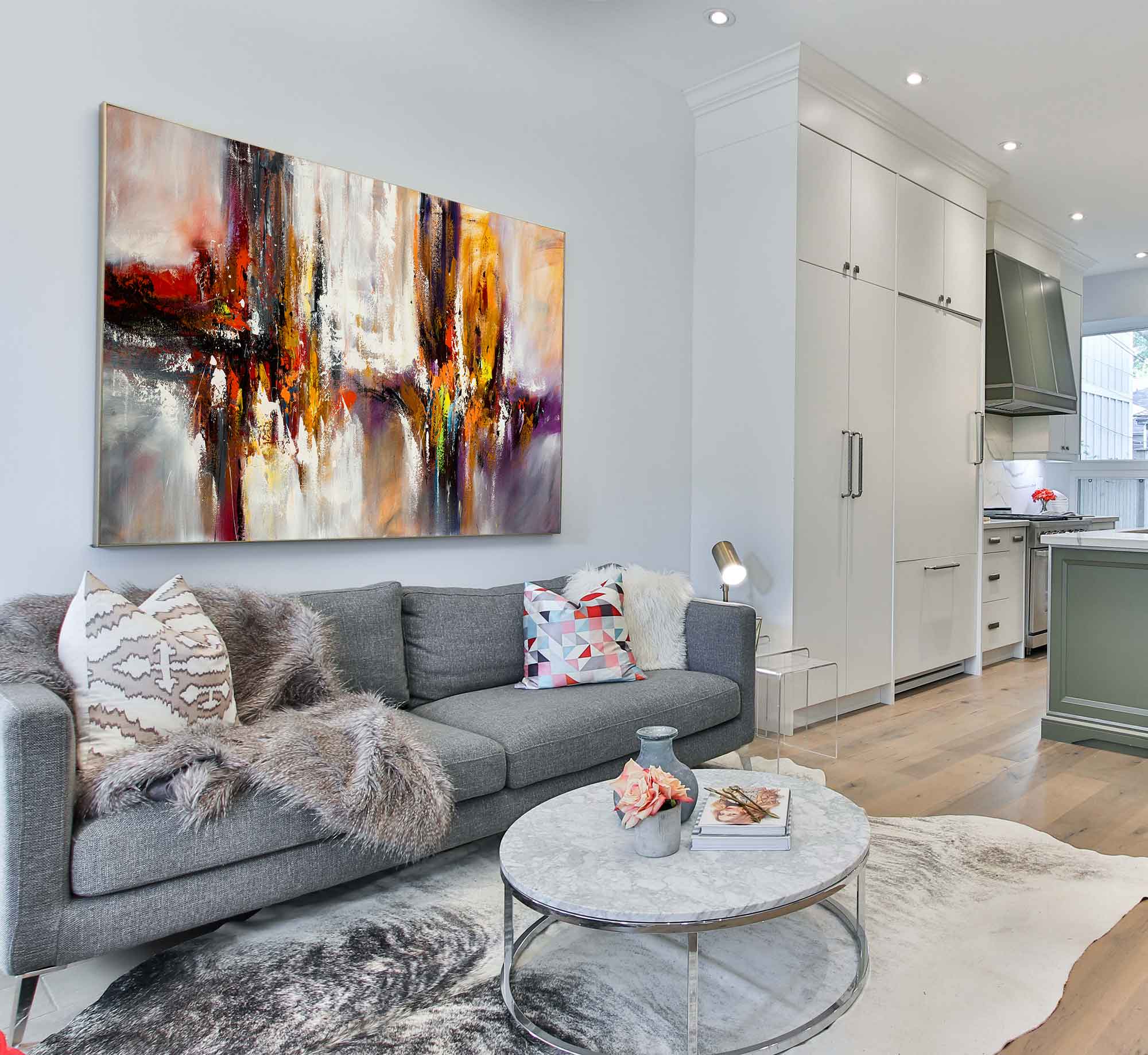 Large abstract wall art in open plan living space