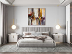 Abstract canvas painting above bedroom wall gold frame