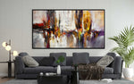 Dancing Together abstract painting above dark grey sofa