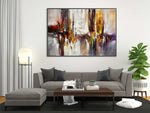 Modern abstract painting above grey sofa black frame